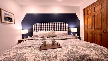 1 bedroom, desk, iron/ironing board, travel cot