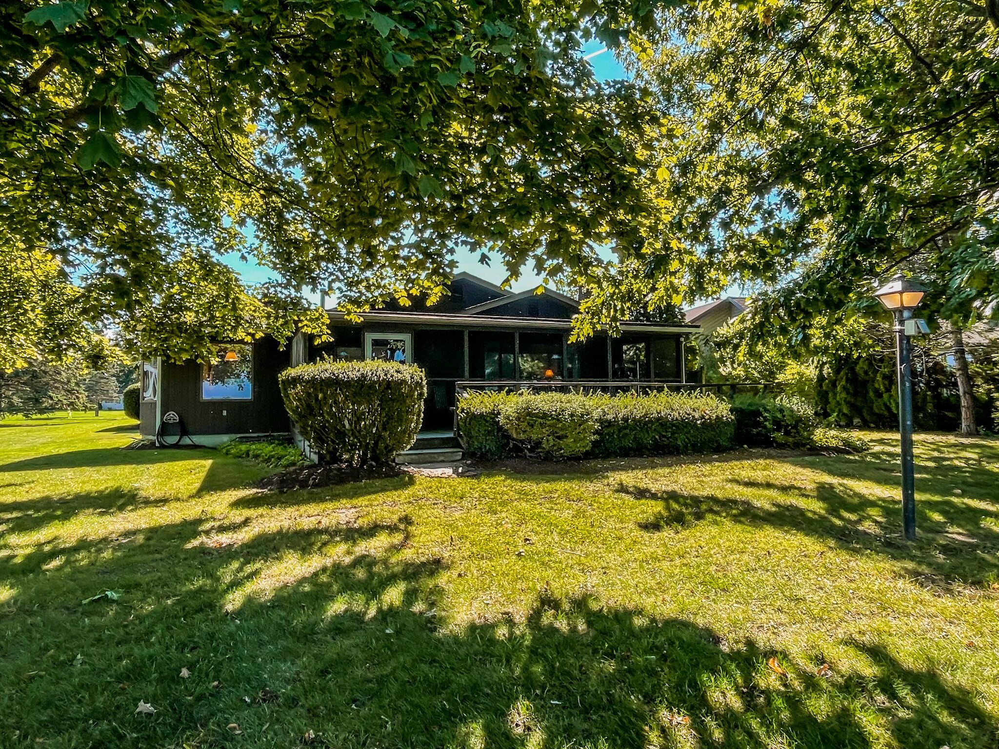 Modern Lake Front home with 75' of Flat Lake Frontage