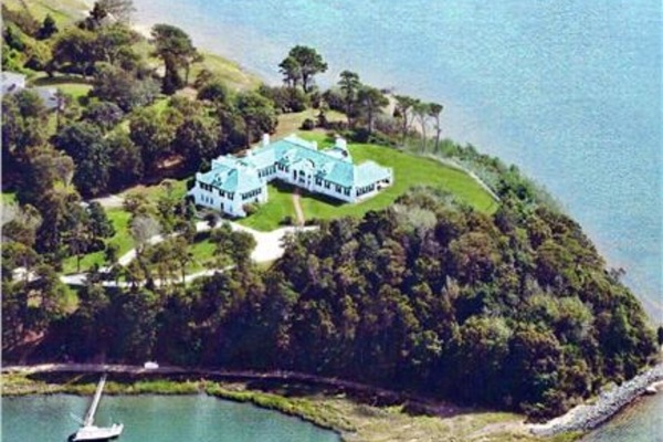 Aerial of the property. A point of land into Pleasant Bay. Water all around.