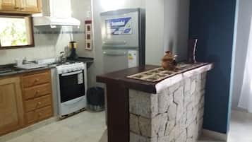 Full-sized fridge, electric kettle, toaster, cookware/dishes/utensils