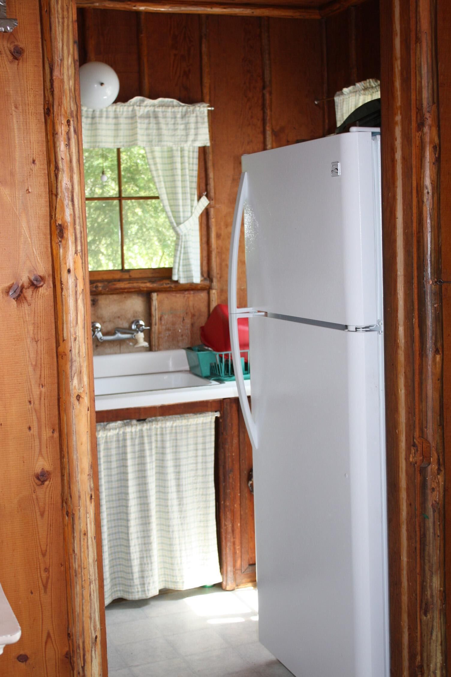 Rustic 1930s Log Cabin Sleeps Seven in Private Estate Setting