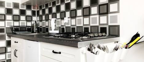 Fridge, stovetop, electric kettle, paper towels