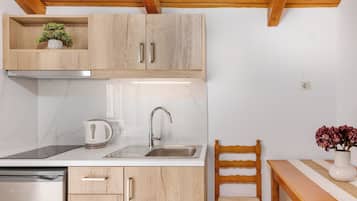 Superior Studio, Pool View | Private kitchen | Full-sized fridge, stovetop, high chair, cookware/dishes/utensils