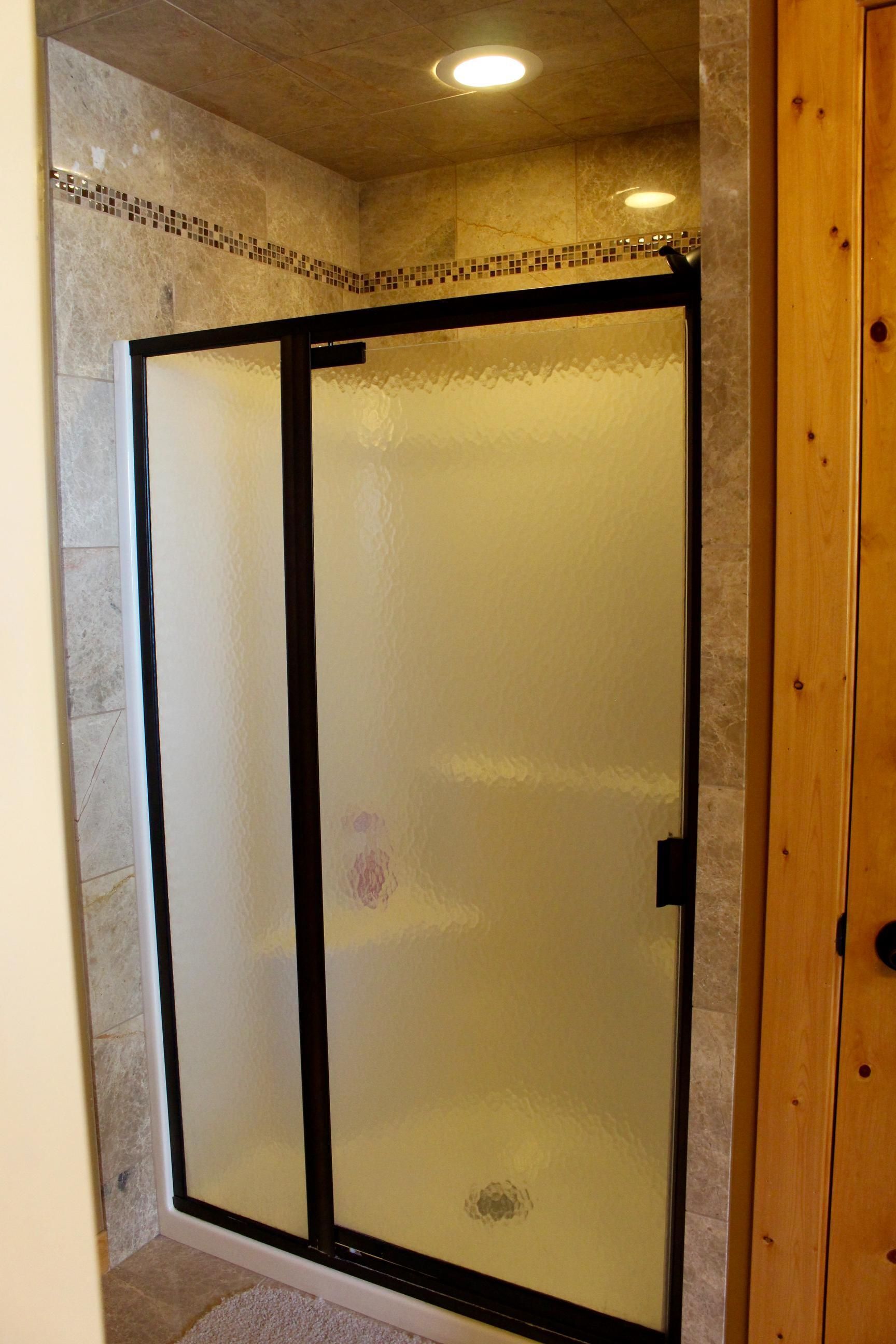 Shower, jetted tub, hair dryer, towels