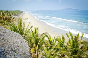 On the beach, sun loungers, beach towels