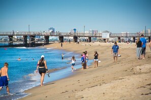 On the beach, sun-loungers, beach towels