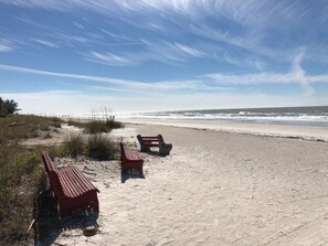 On the beach, sun loungers, beach towels