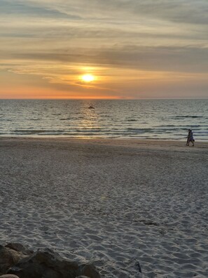 On the beach, sun-loungers, beach towels