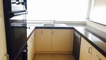 Microwave, dishwasher, high chair, cookware/dishes/utensils