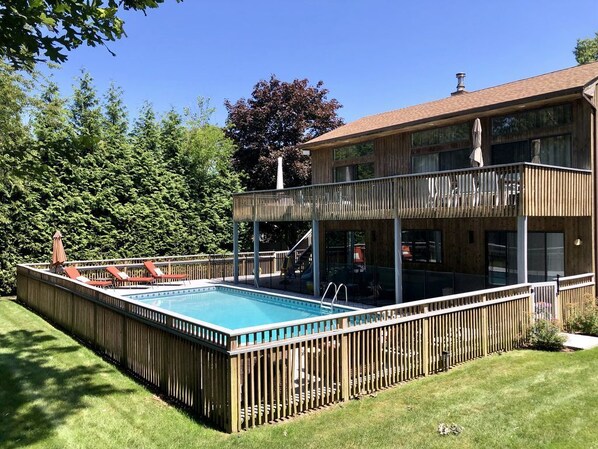 Outdoor pool, a heated pool - Modern Family Retreat with Heated Pool, Playground and Peloton (Hampton Bays)