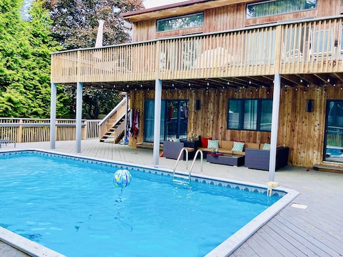 Modern Family Retreat with Heated Pool, Playground and Peloton