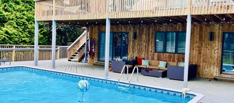 Modern Family Retreat with Heated Pool, Playground and Peloton