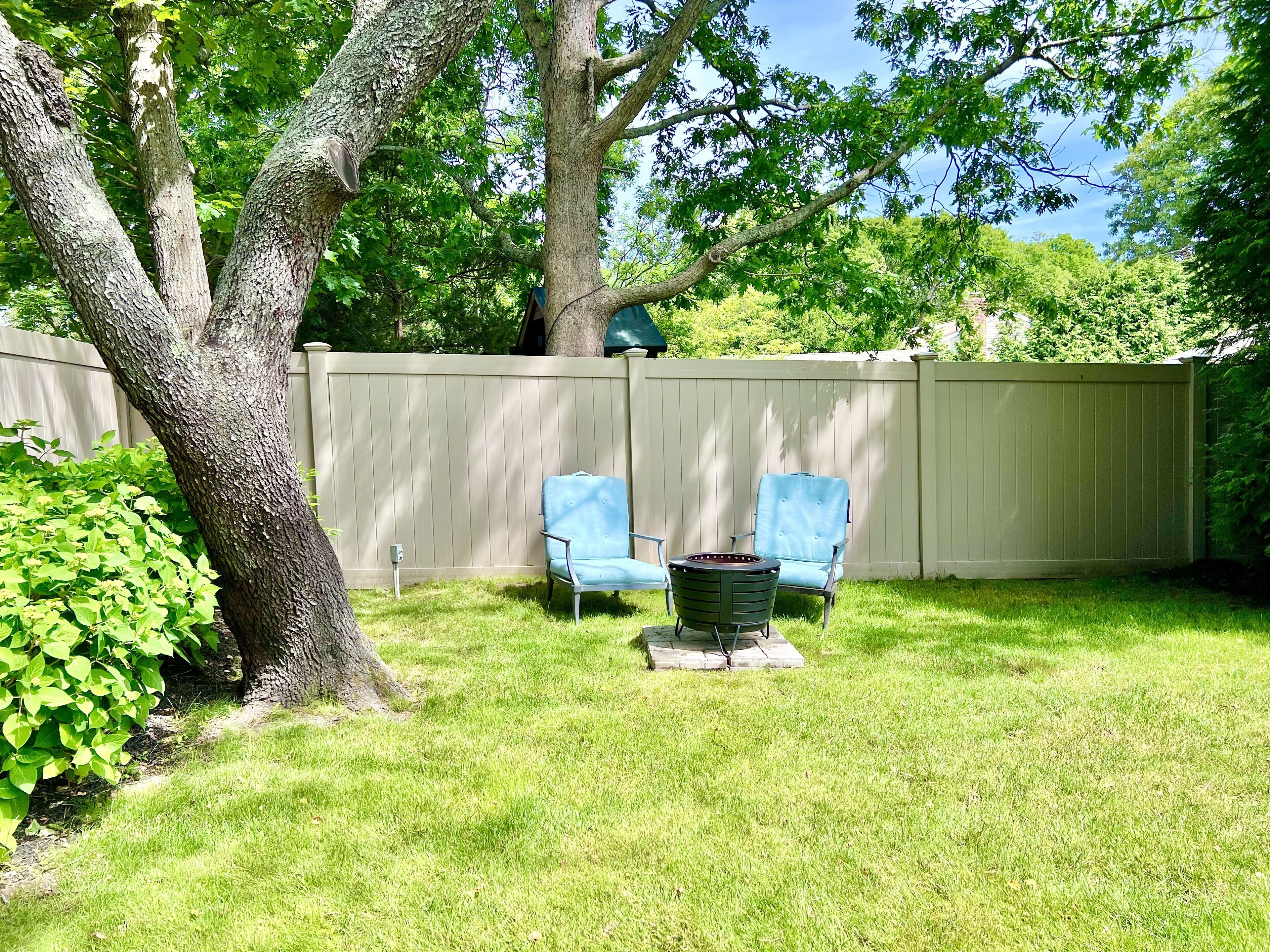 Fire pit during the day (more chairs available for gathering around fire pit)