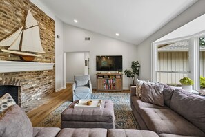 TV, fireplace, DVD player, smart speakers
