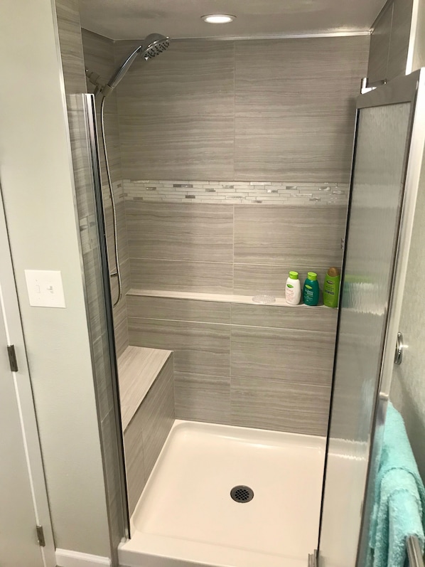 Shower, hair dryer, towels, soap