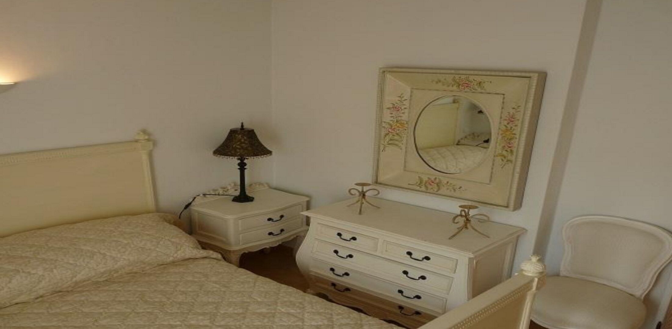 Main Double Bedroom with views to the shared pool