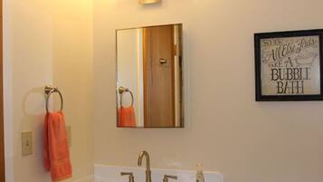 Bathtub, hair dryer, towels