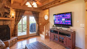 Smart TV, chimenea, reproductor de DVD y videoteca