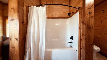 Combined shower/tub, hair dryer, towels, toilet paper