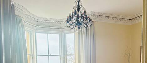 Smart TV, fireplace, books, printers