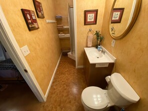 Shower, towels, shampoo, toilet paper