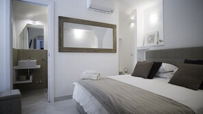 4 عدّة غرف نوم ومكواة/لوح كي وواي فاي مجانًا وملاءات أسرّة