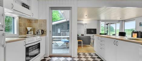 Geladeira, cooktop, lava-louças, cafeteira/chaleira