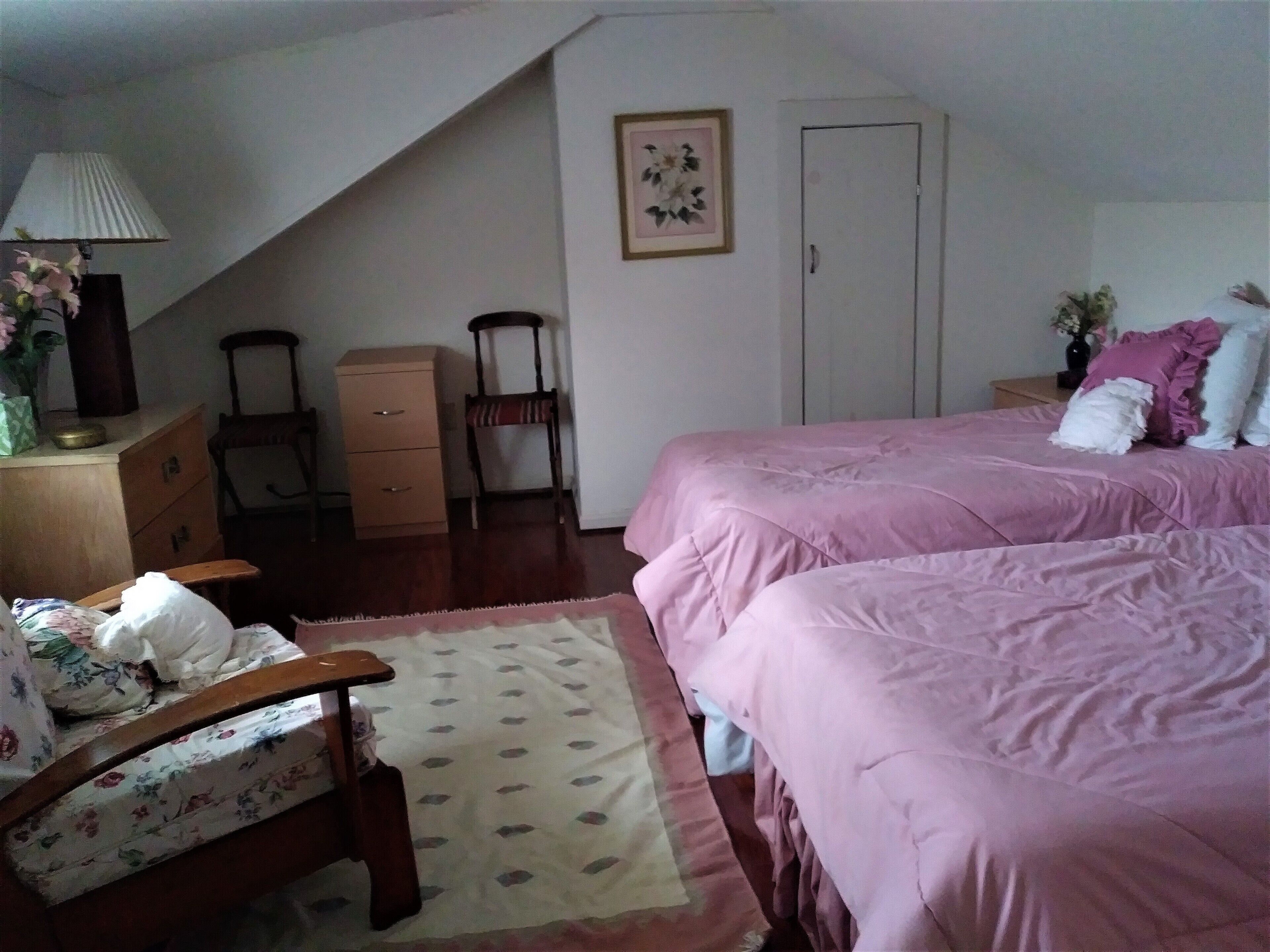 Charming restored Victorian Farmhouse and cottage on a large rural lot.