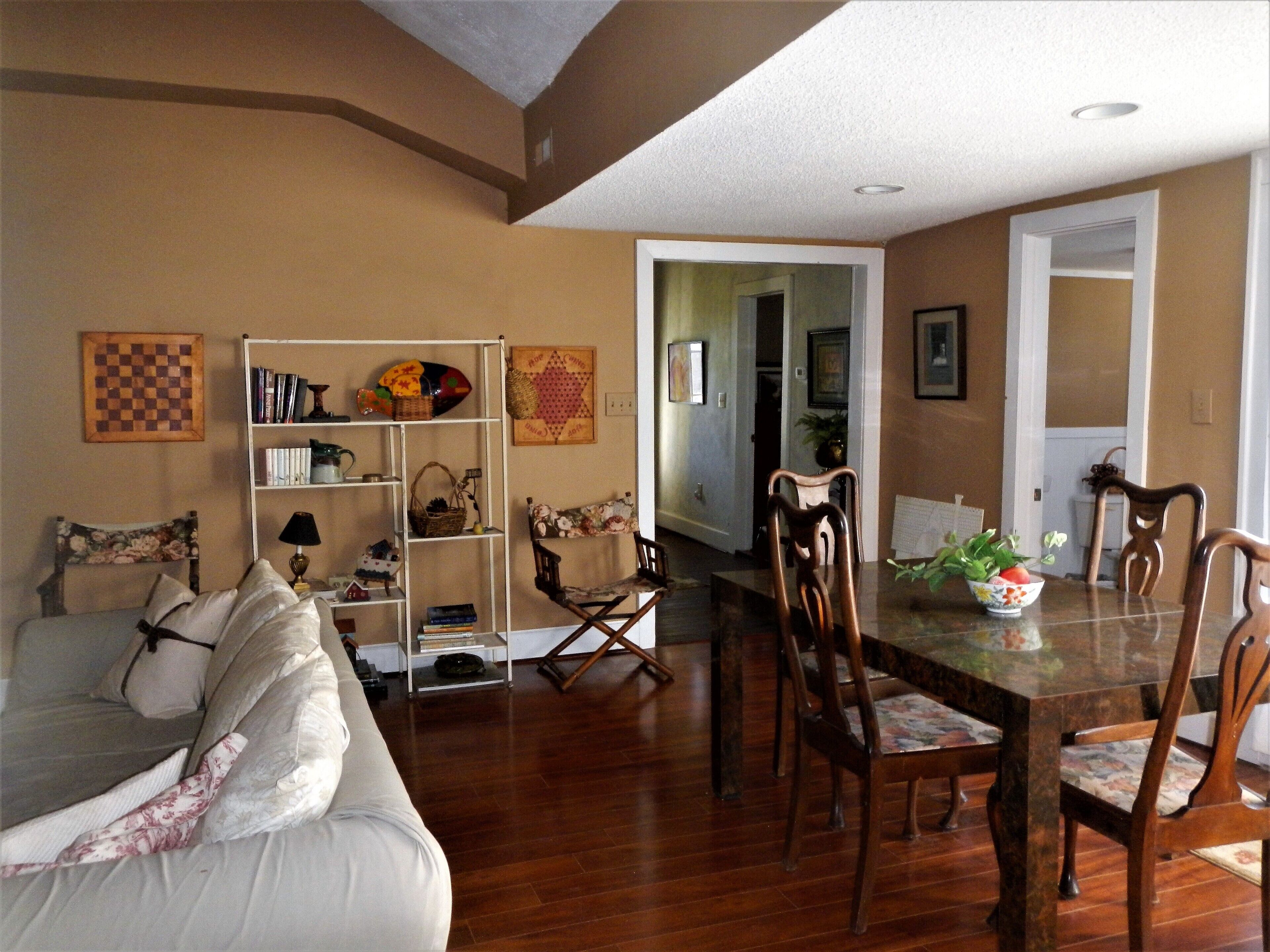 Charming restored Victorian Farmhouse and cottage on a large rural lot.