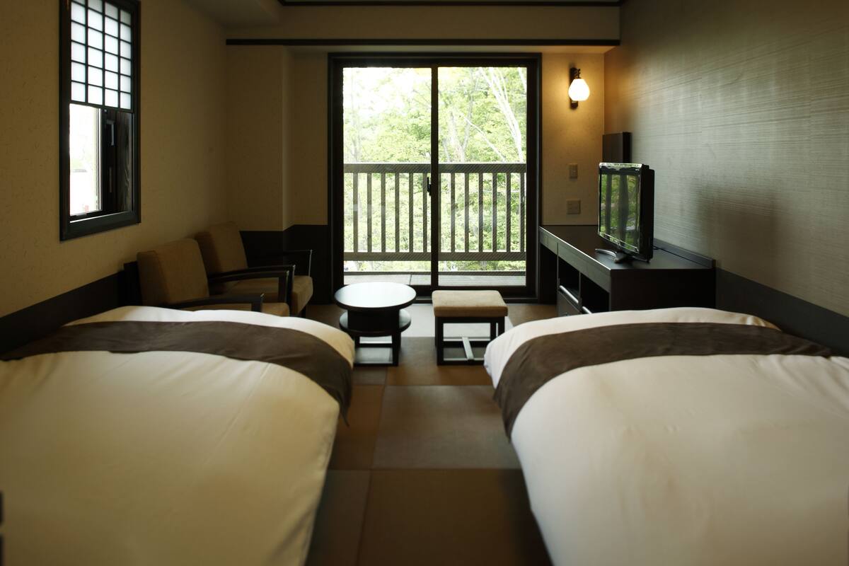 Japanese Style Twin Room (2 Beds or 2 Bed or 2 mattresses) | In-room safe, iron/ironing board (on request), WiFi (free), bed sheets