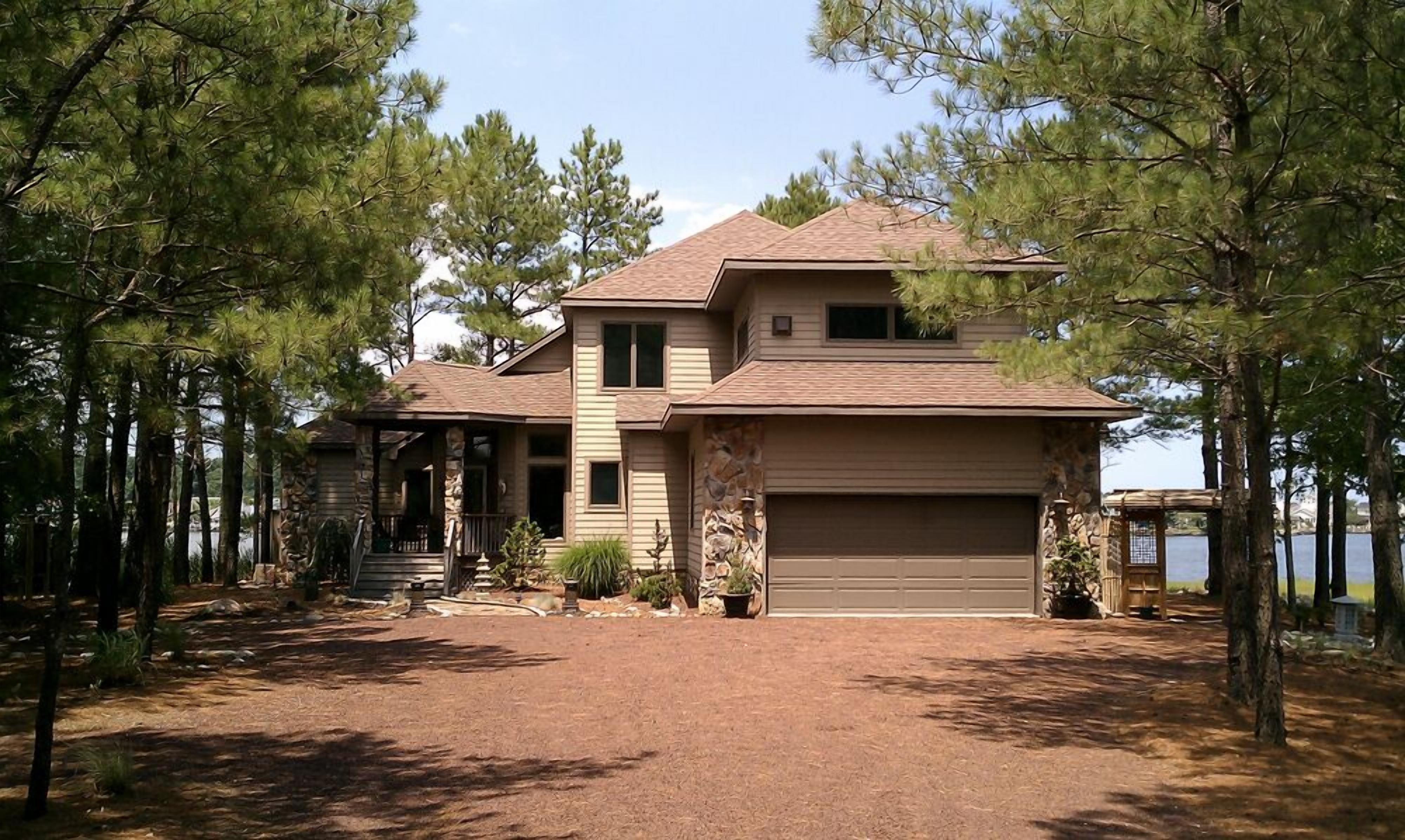 Scenic Water front secluded house with pier and view of the bay  overlooking OC