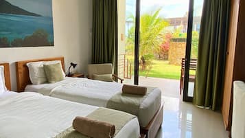 Kamar Twin Deluks | Meja kerja, tirai kedap cahaya, Wi-Fi gratis, dan seprai linen