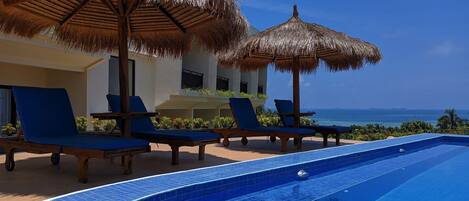 Outdoor pool, pool umbrellas, pool loungers