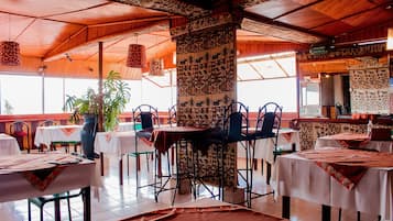 Breakfast, lunch, dinner served; local and international cuisine