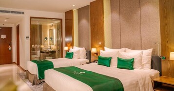 Quarto família (Deluxe) | Roupas de cama premium, edredons de pluma, frigobar, cofres nos quartos