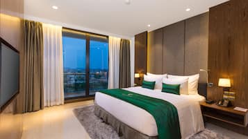 Executive Suite | 1 bedroom, down comforters, minibar, in-room safe