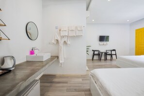 Ropa de cama de alta calidad y minibar 