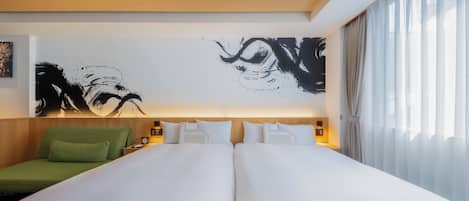 Premium bedding, down duvets, pillow-top beds, in-room safe