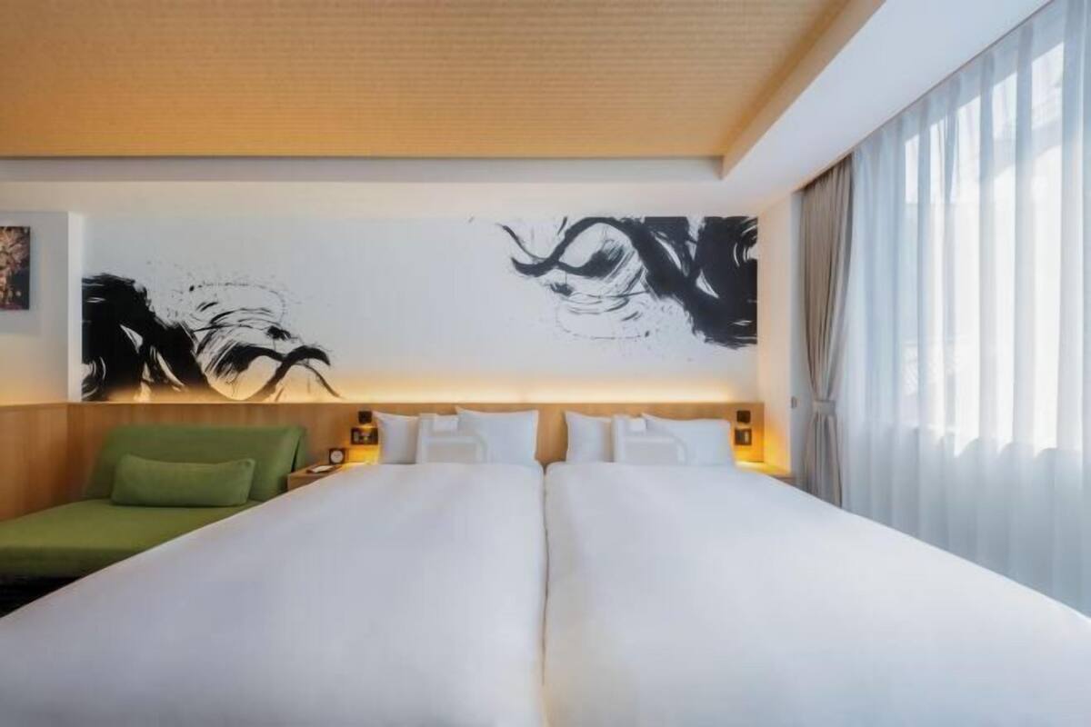 Luxe beddengoed, donsdekens, pillowtop-bedden, een kluis op de kamer