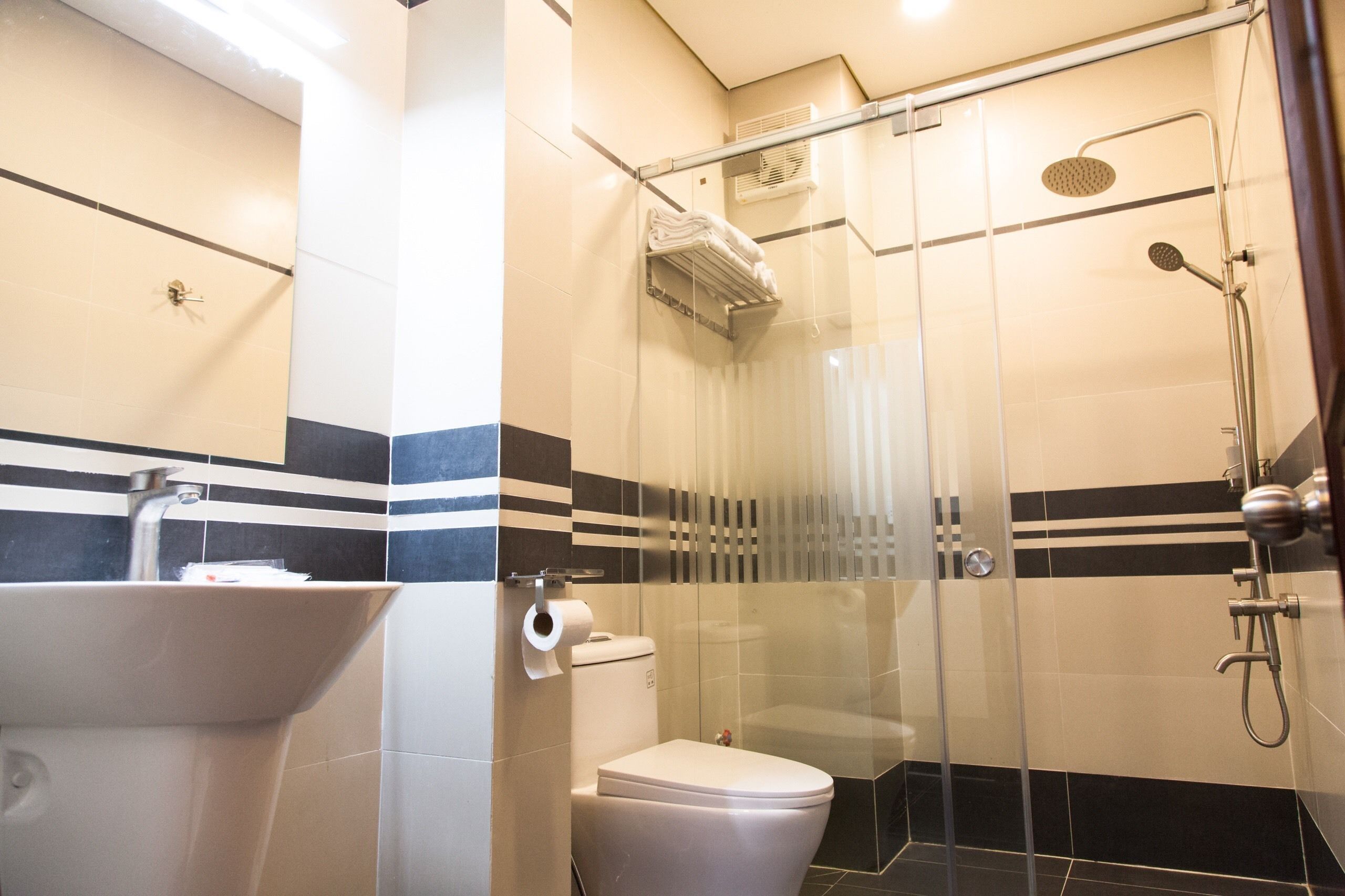 Shower, free toiletries, hair dryer, slippers