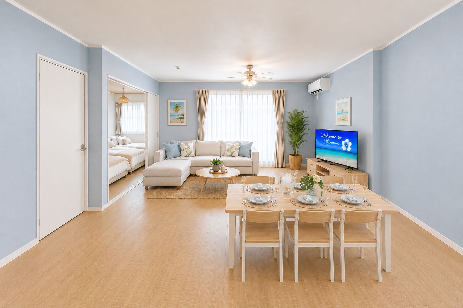 Una sala de estar moderna con comedor, televisor y ventilador de techo.