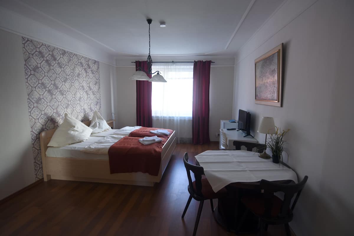 Superior Apartment, 3 Bedrooms | Desk, iron/ironing board, free WiFi