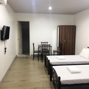 Blackout curtains, rollaway beds, free WiFi, bed sheets