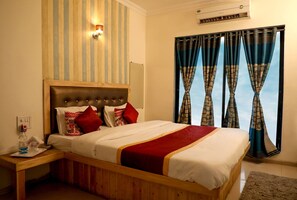 Deluxe Room | Rollaway beds, bed sheets, wheelchair access - Orange Inn (Panvel)