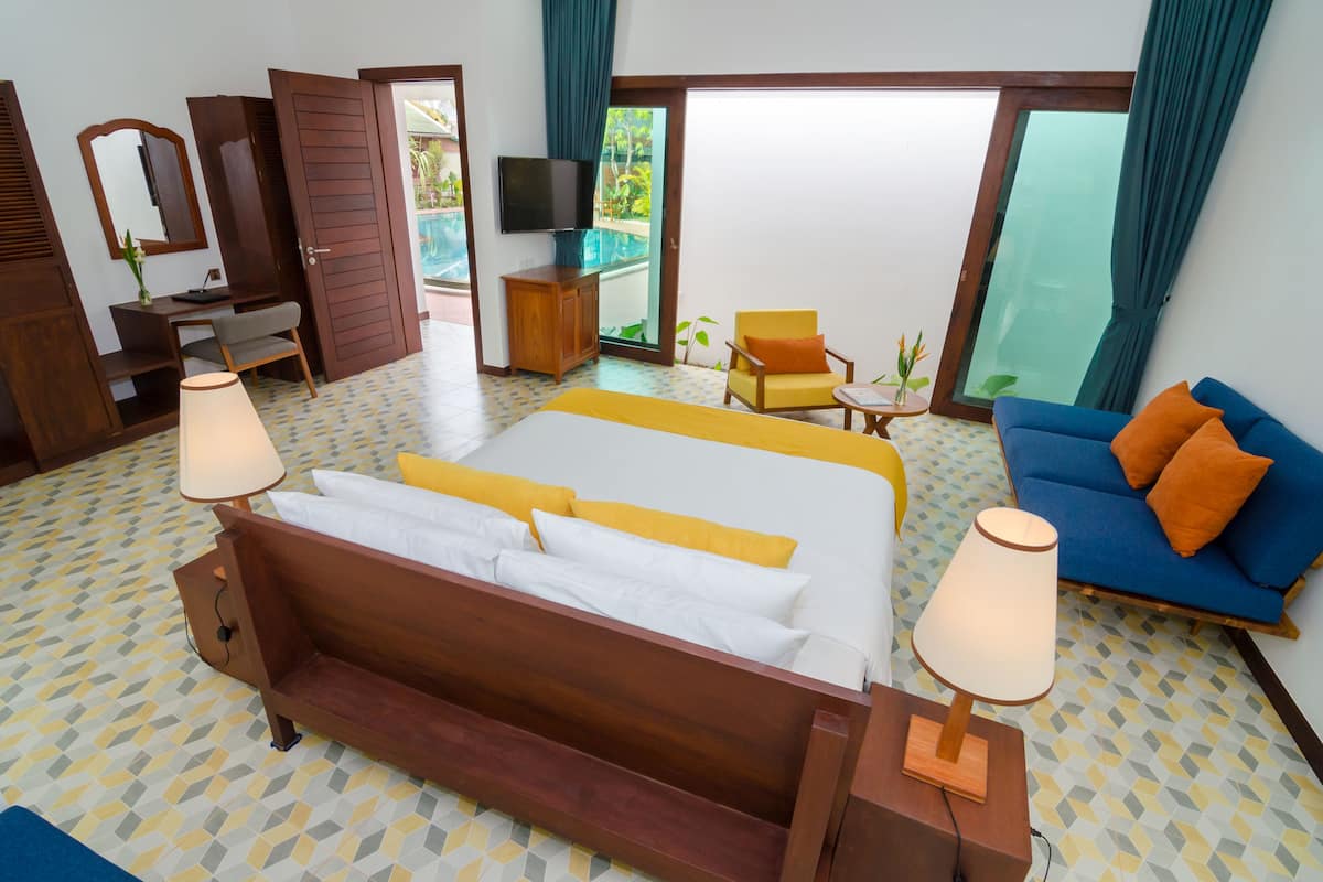 Superior Apartment, Pool View (including Free Pick Up) | Minibar, in-room safe, blackout drapes, iron/ironing board