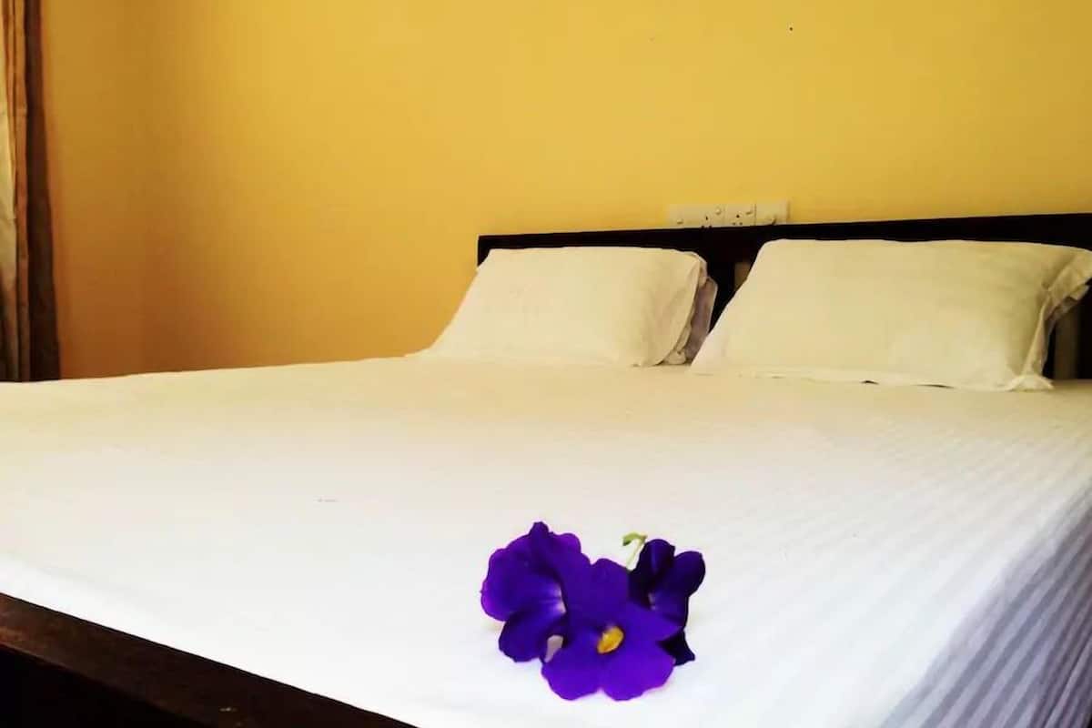 Deluxe Triple Room, 1 King Bed, Non Smoking, Hill View | Premium bedding, desk, iron/ironing board, bed sheets