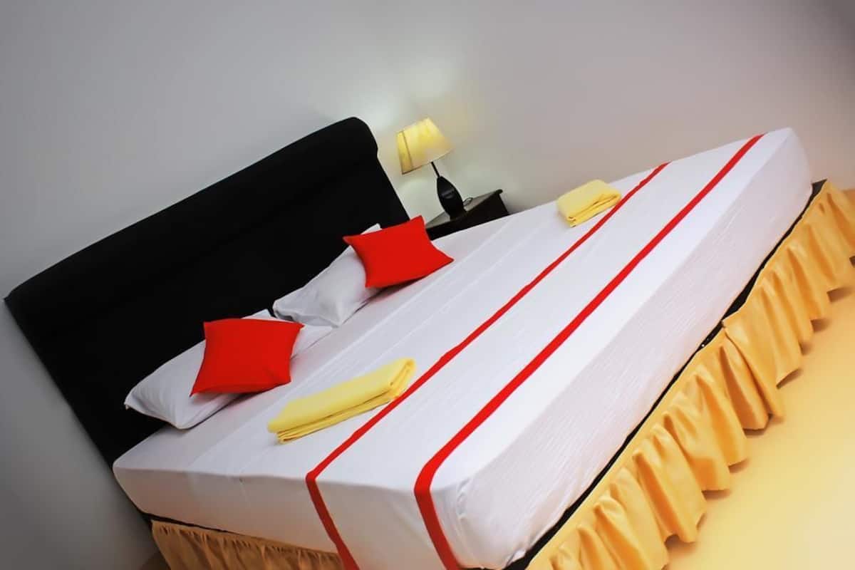 Deluxe Quadruple Room, Multiple Beds, Non Smoking, Hill View | Premium bedding, desk, iron/ironing board, bed sheets