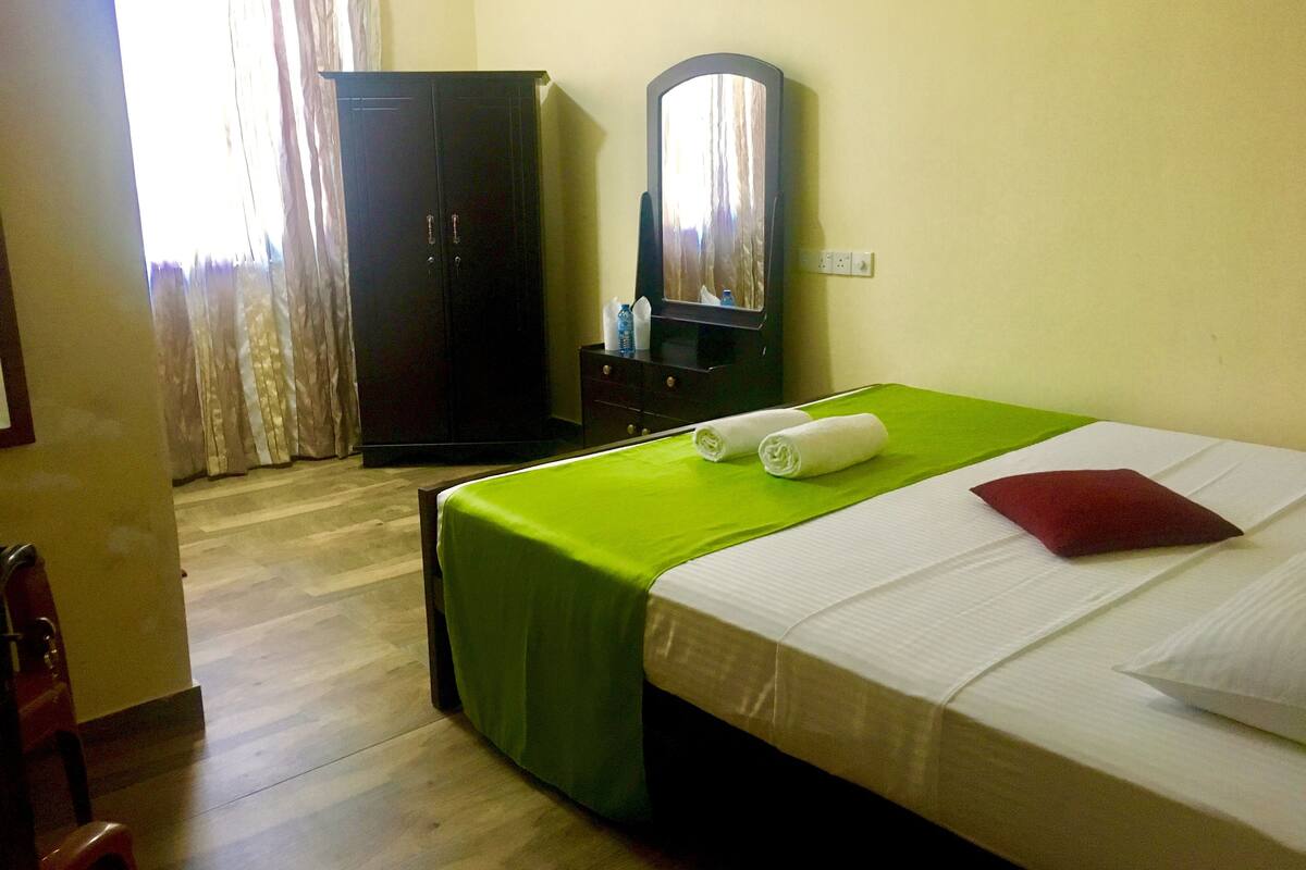 Deluxe Triple Room, 1 King Bed, Non Smoking, Hill View | Premium bedding, desk, iron/ironing board, bed sheets
