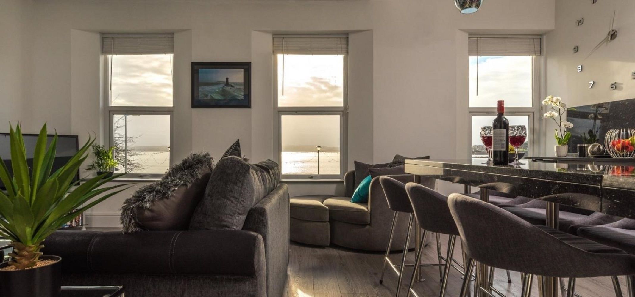 Sandybanks-Stylish Apartment | Living area | Flat-screen TV