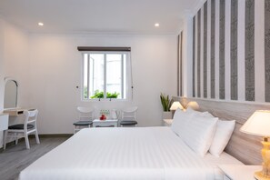 Premium bedding, memory-foam beds, free minibar items, in-room safe - The One Hotel Ben Thanh (Ho Chi Minh City)